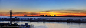 Morning glow with fog along riverbank